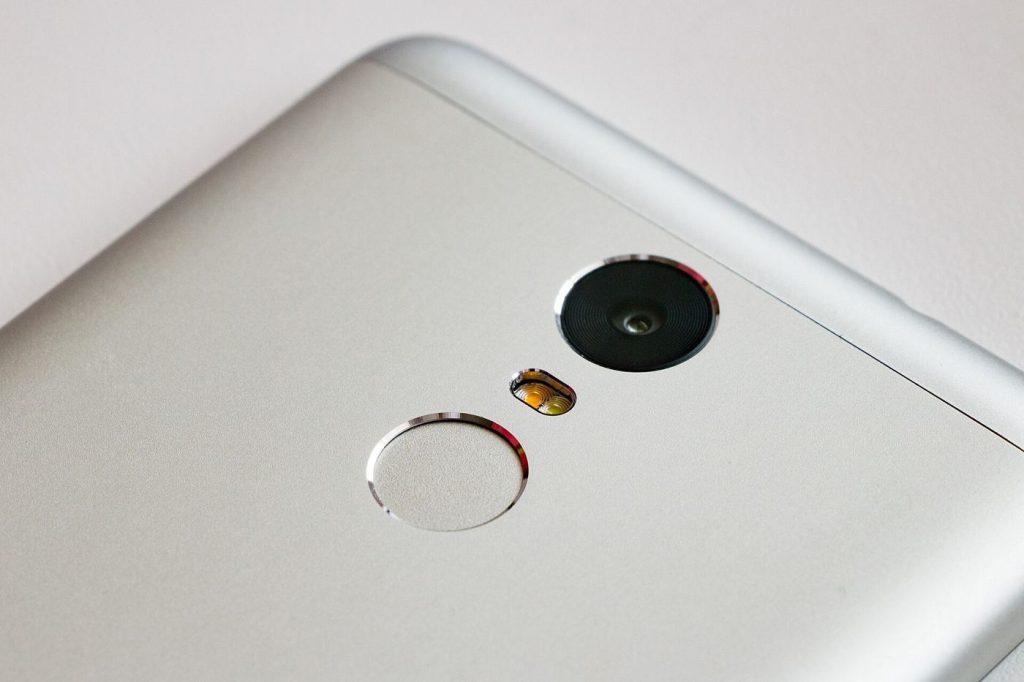 Passkeys and Biometrics Reshape Online Sign-Ins Photograph related to passwordless sign-in, showing fingerprint login smartphone security.